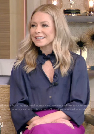 Kelly's black ruffle neck blouse on Live with Kelly and Ryan