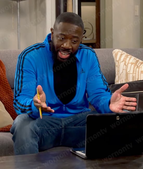 Malcolm's blue Adidas jacket on The Neighborhood