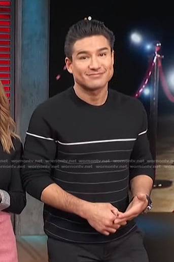Mario Lopez's black striped sweater on Access Hollywood