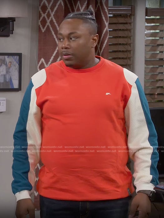 Marty's colorblock sweater on The Neighborhood
