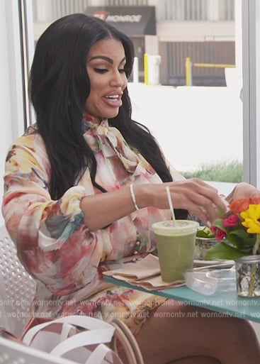Mia's floral tie neck dress on The Real Housewives of Potomac