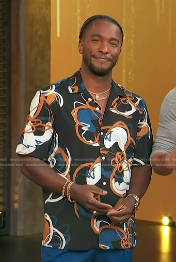 Scott's black floral short sleeve shirt on Access Hollywood