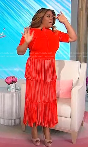 Sherri's orange top and fringed skirt on Sherri