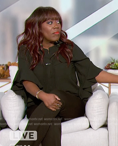 Sheryl's green tie neck blouse on The Talk