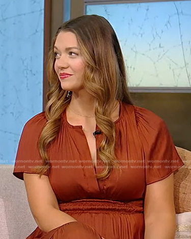 Tayler Burks's brown v-ncek midi dress on Tamron Hall Show