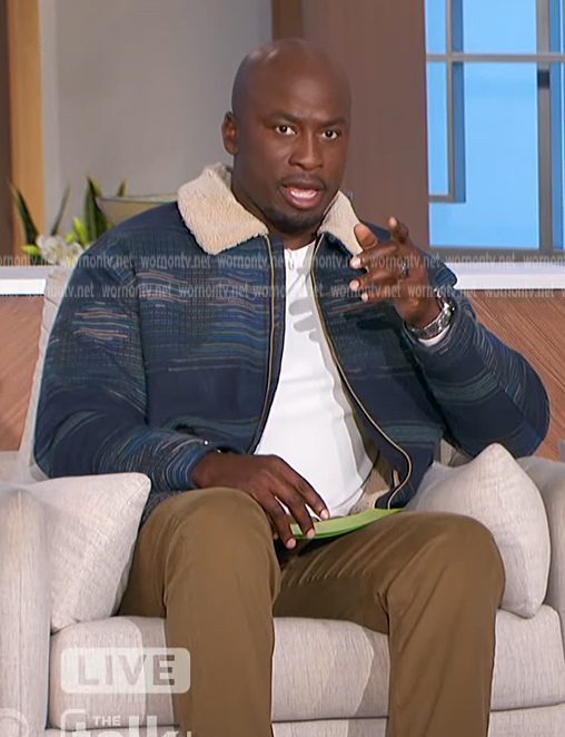Akbar's blue sherpa jacket on The Talk