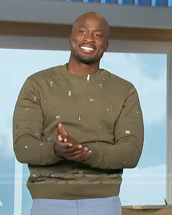 Akbar's green embroidered sweatshirt on The Talk