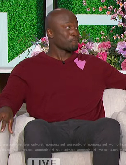 Akbar's red heart print sweater on The Talk