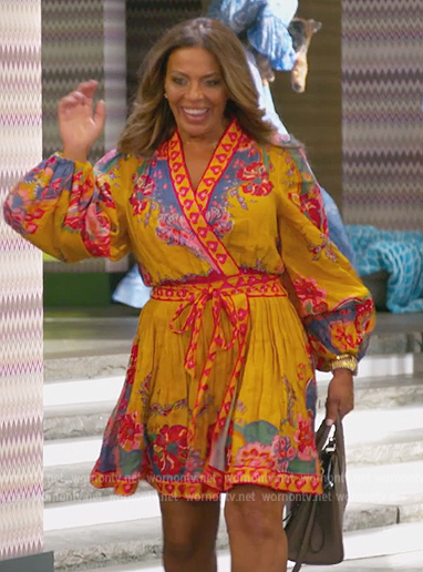 Dolores's yellow floral print wrap dress on The Real Housewives of New Jersey