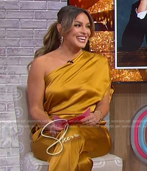 Emily Orozco's gold satin one shoulder top and pants on Sherri