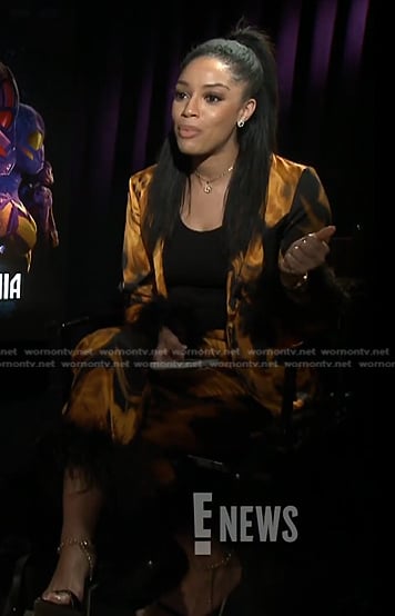 Francesca Amiker's orange printed jacket and pants on E! News