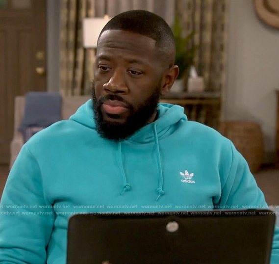 Malcolm's turquoise Adidas hoodie on The Neighborhood