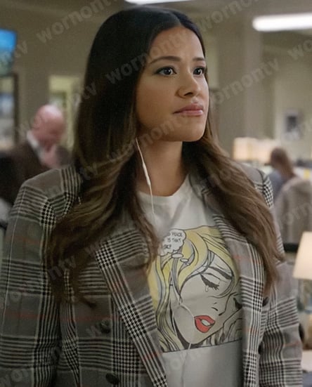 Nell's graphic tee and grey plaid blazer on Not Dead Yet