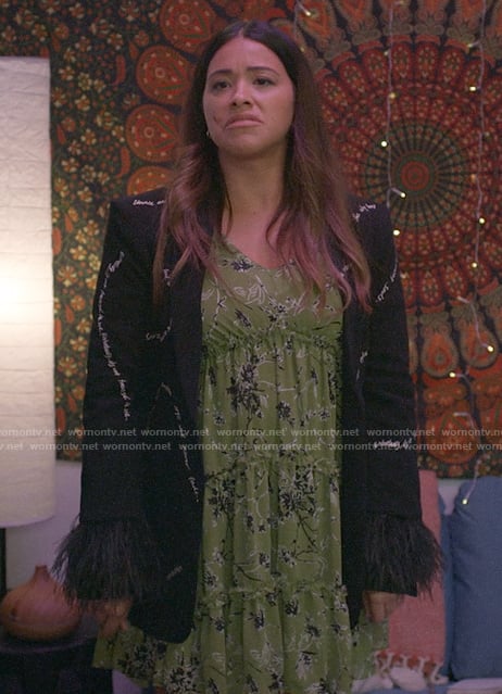 Nell's green floral mini dress and black feather trim blazer on Not Dead Yet