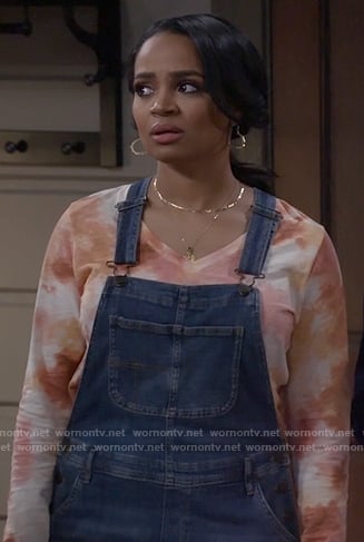 Randi's tie dye t-shirt and denim overalls on Call Me Kat