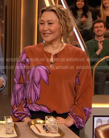 Robin Black's orange floral print blouse on The Drew Barrymore Show