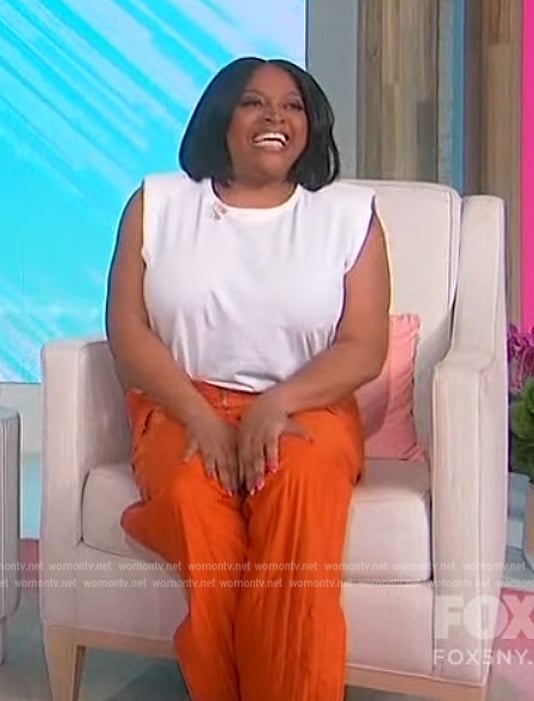 Sherri's orange pleated pants on Sherri