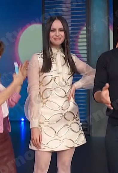 Sofia Carson's ivory chain mini dress on Access Hollywood