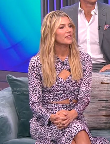 Amanda Kloots's pink leopard print dress with cutouts on CBS Mornings