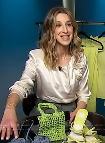 Andrea Lavinthal's satin bow applique blouse on Access Hollywood