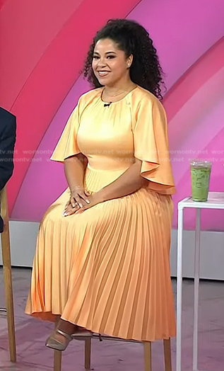 Arianna Davis's orange pleated dress on Today