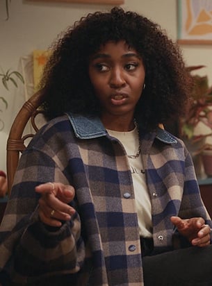 Ayesha's blue check jacket with denim collar on Abbott Elementary