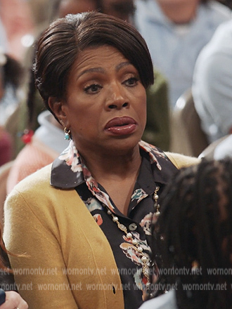 Barbara's black floral print blouse on Abbott Elementary