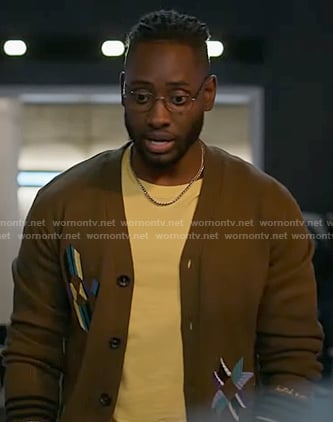 Chester's olive green embroidered cardigan on The Flash