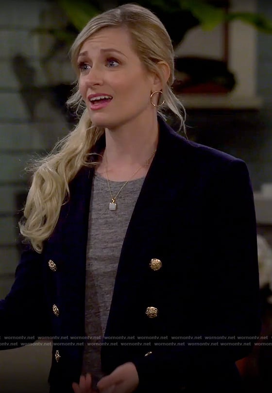 Gemma's navy blazer with gold buttons on The Neighborhood