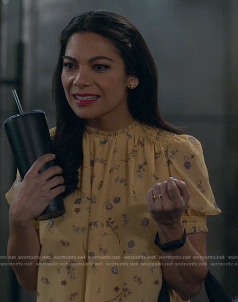 Helen's yellow floral top on True Lies