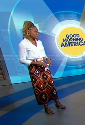 Janai's orange geometric print pants on Good Morning America
