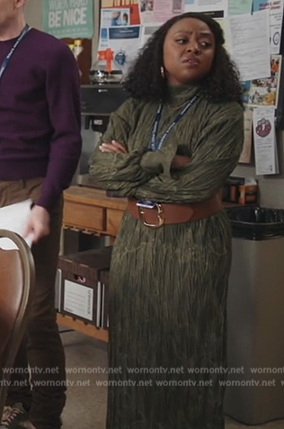 Janine's green printed mock neck dress on Abbott Elementary