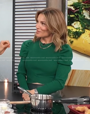 Kit's green puff sleeve sweater on Access Hollywood