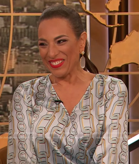Michelle Miller's chain print blouse on The Drew Barrymore Show