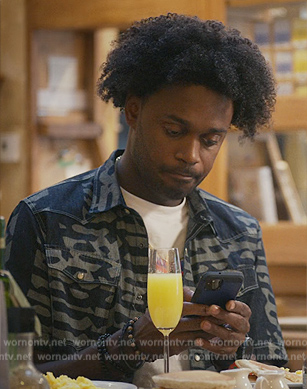 Sherm's black printed button down shirt on Grand Crew