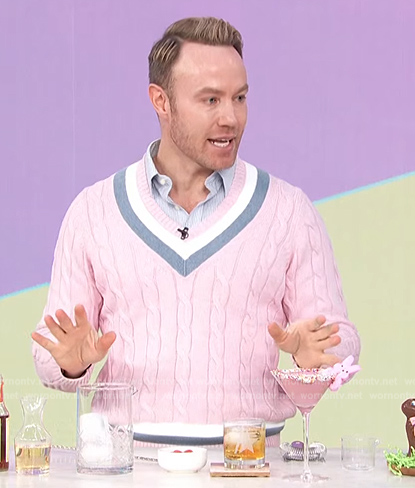 Paul Zahn's pink varsity stripe sweater on Access Hollywood