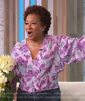 Wanda Skyes' purple floral ruffle blouse on Tamron Hall Show