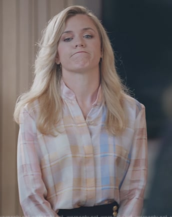Sadie's plaid shirt on American Auto