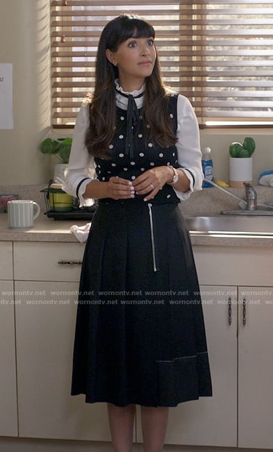 Sam's polka dot sweater vest and pleated skirt on Not Dead Yet