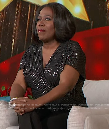 Sheryl's black metallic stripe wrap top on The Talk