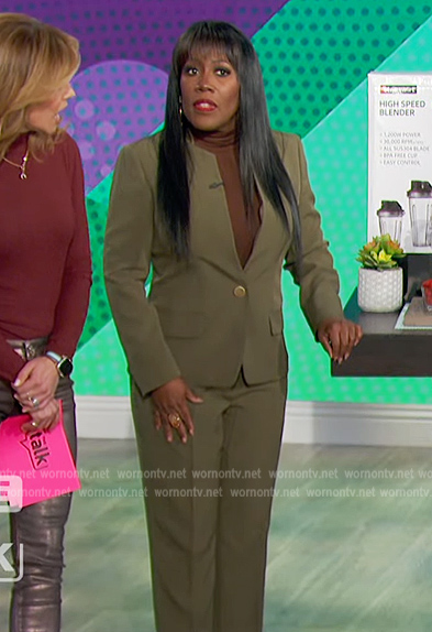 Sheryl's green blazer and pants on The Talk