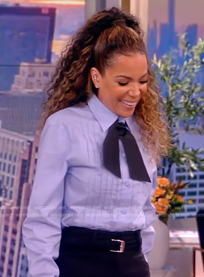 Sunny's blue pleated tie neck blouse on The View