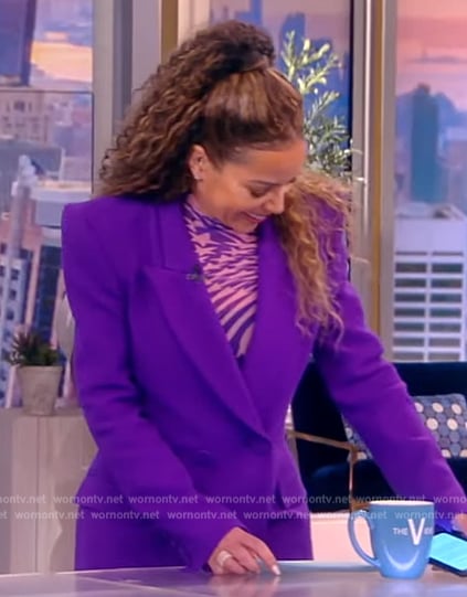 Sunny's purple blazer and star print mesh top on The View