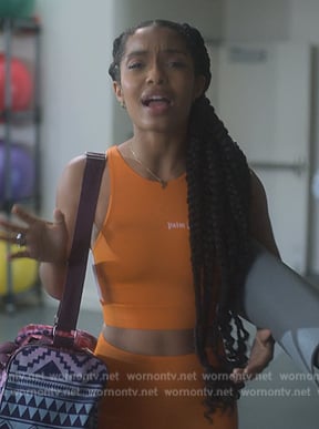 Zoey's orange crop top and leggings on Grown-ish
