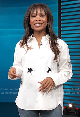 Zuri's white star cutout shirt on Access Hollywood