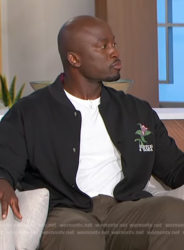 Akbar's black embroidered bomber jacket on The Talk