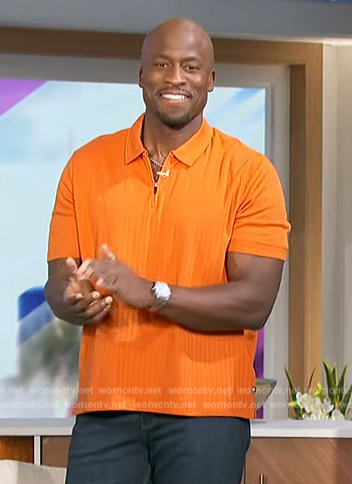 Akbar's orange ribbed polo on The Talk