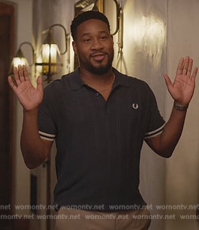 Anthony's navy polo on Grand Crew