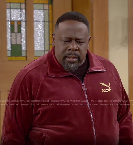 Calvin's red velour Puma track suit on The Neighborhood