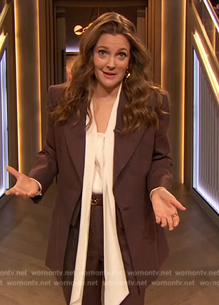 Drew's burgundy suit and earrings on The Drew Barrymore Show